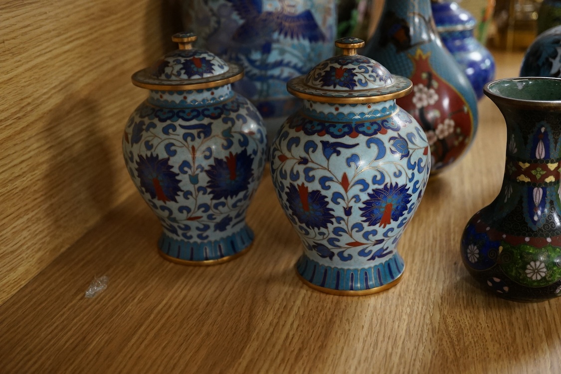 Thirteen various sized Chinese cloisonné enamel jars with covers and similar vases, tallest vase 31cm high.